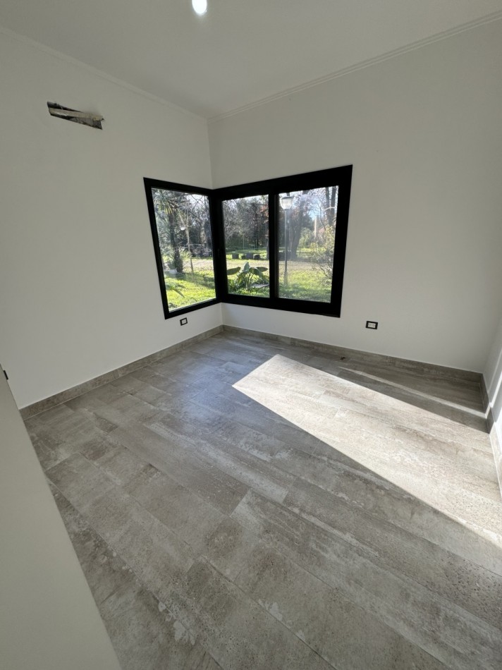 HERMOSA CASA A ESTRENAR CON TRES DORMITORIOS EN BARRIO CERRADO LOS GINKGOS